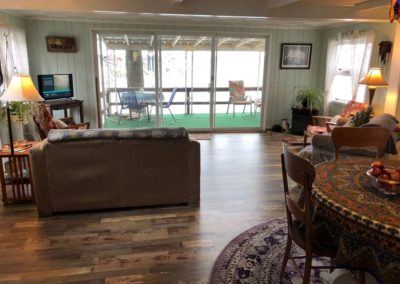 Arrowhead Beach living room, dining, deck | Savannah House Wine Country Inn & Cottages | Finger Lakes, NY