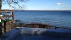 Arrowhead beach hot tub lake view | Savannah House Wine Country Inn & Cottages | Finger Lakes, NY