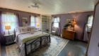 Farm House bedroom purple | Savannah House Wine Country Inn & Cottages | Finger Lakes, NY