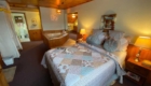 Suite - Bedroom Towards Jaccuzi and Living Room Doorway | Savannah House Wine Country Inn & Cottages | Finger Lakes, NY